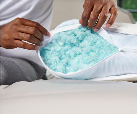 blue pillow stuffing is shown inside pillow